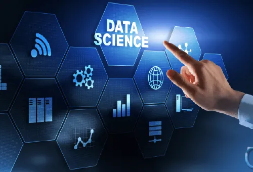 2 Women examining laptop