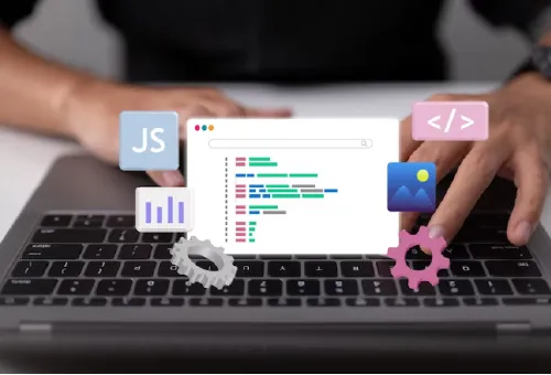 2 Women examining laptop