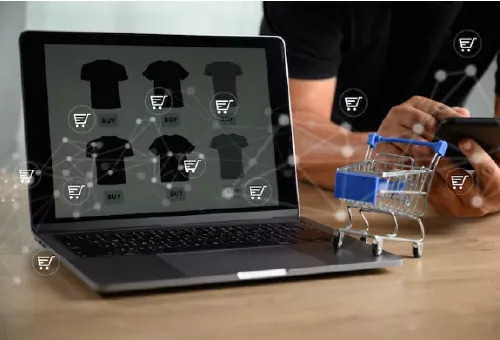 2 Women examining laptop