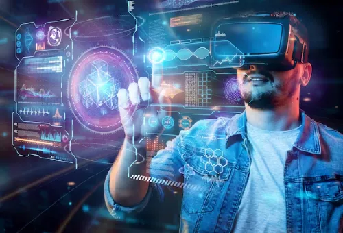 2 Women examining laptop